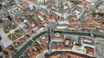 Automatically Produced True Orthophotos for Large Urban Areas